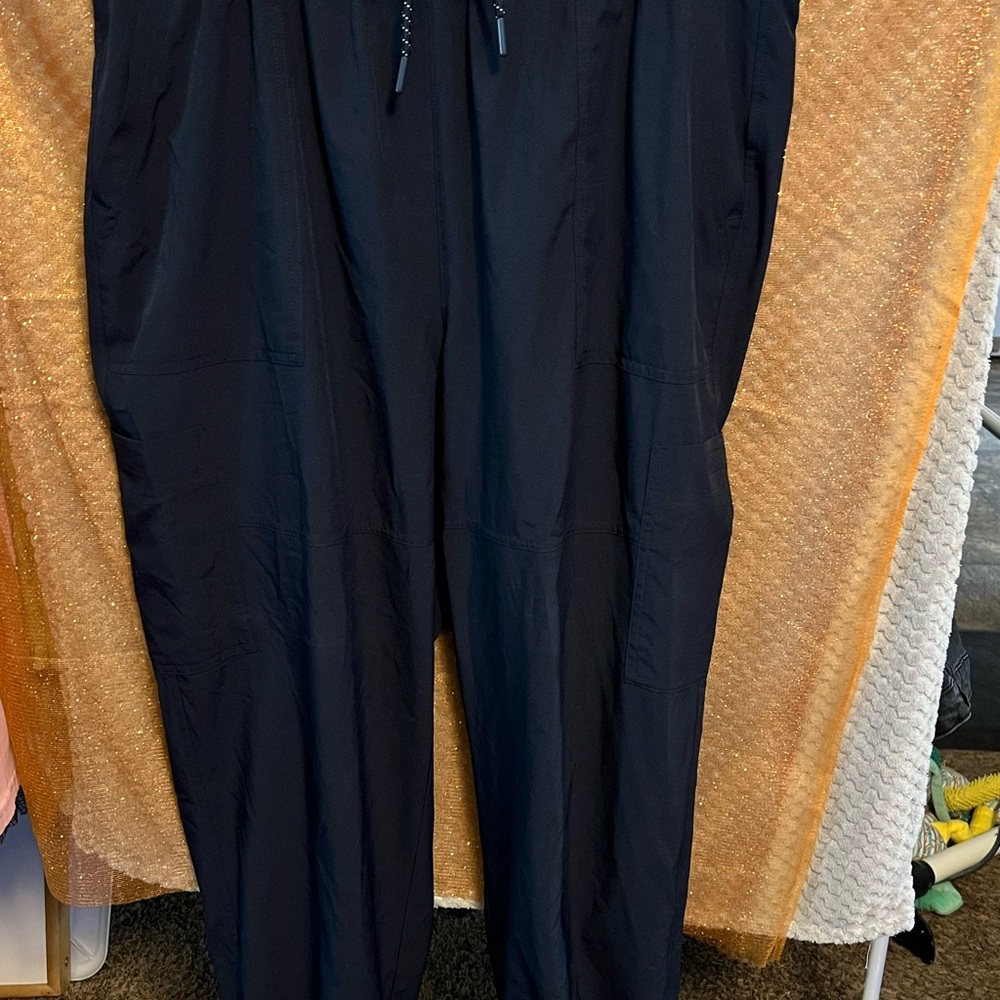 Brand: Never not Hustling beautiful navy blue color. Waist to ankle loose fit.